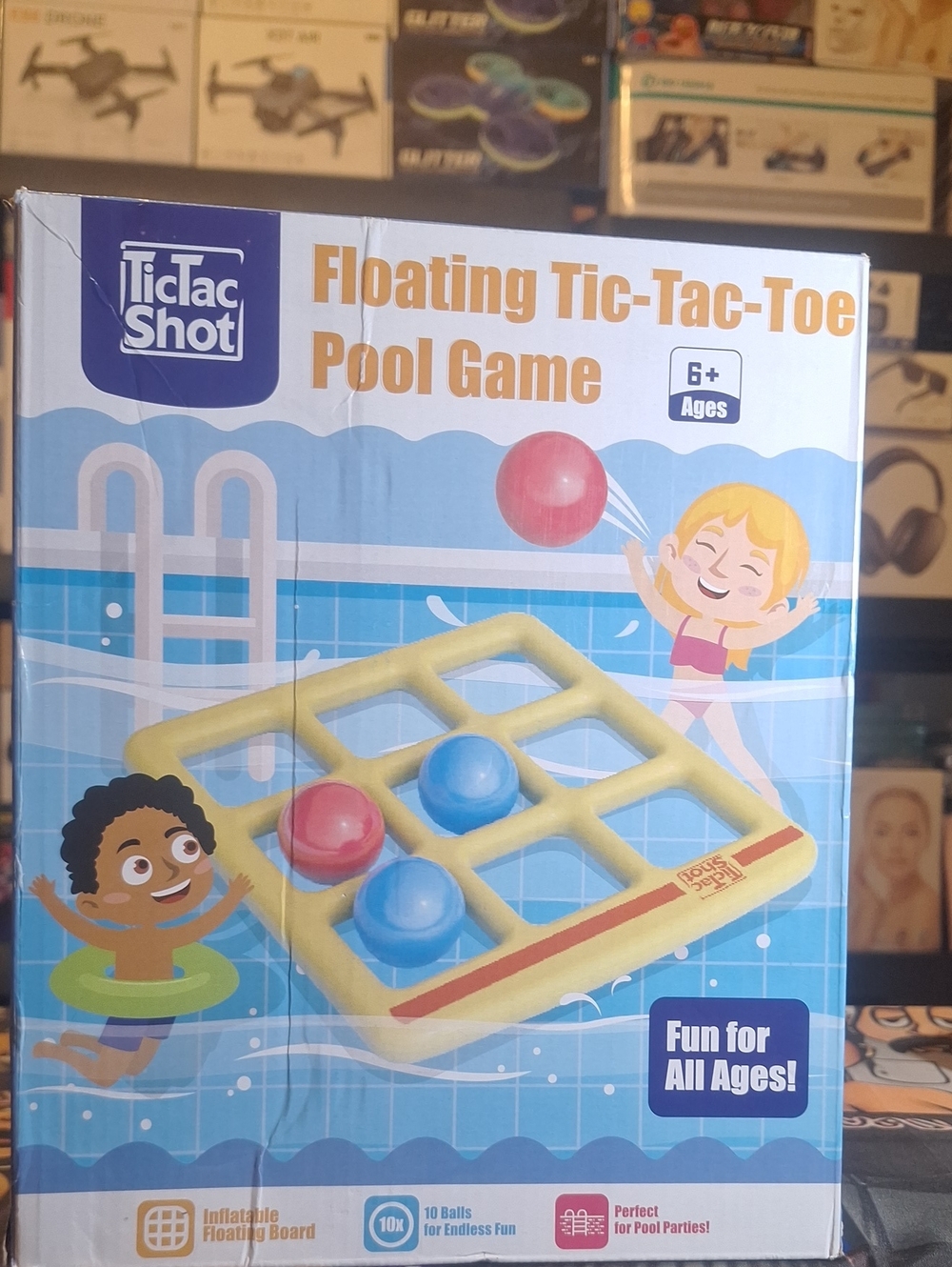 TicTac Shot Floating Tic-Tac-Toe Pool Game - Yellow with Blue & Red Pieces
